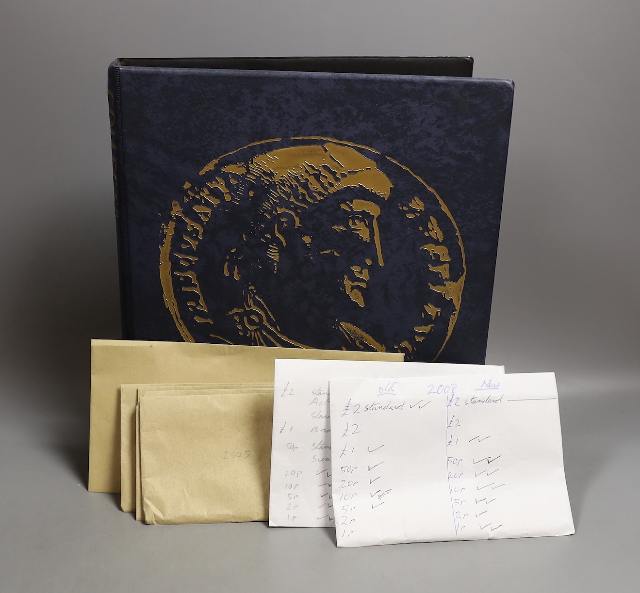 An album of British crowns, halfcrowns, florins and decimal 50 pence and 20 pence coins, including 1819 crown F, etc. and various loose UK coins and banknotes in envelopes